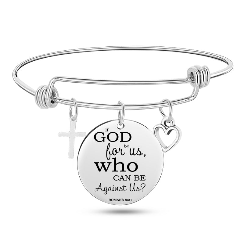 Silver bracelet with a round charm featuring a religious quote on a white background