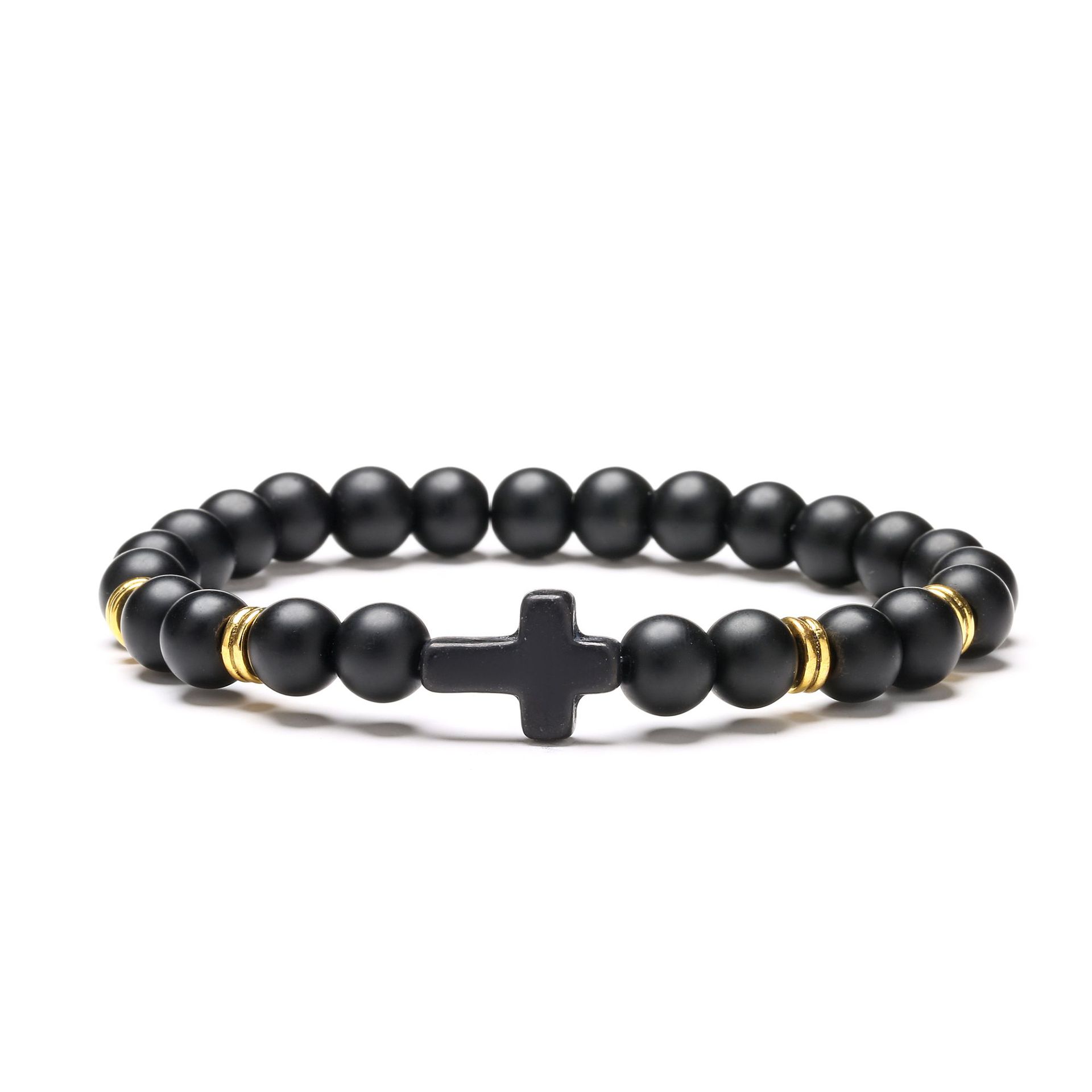 Black beaded bracelet with a cross charm on a white background